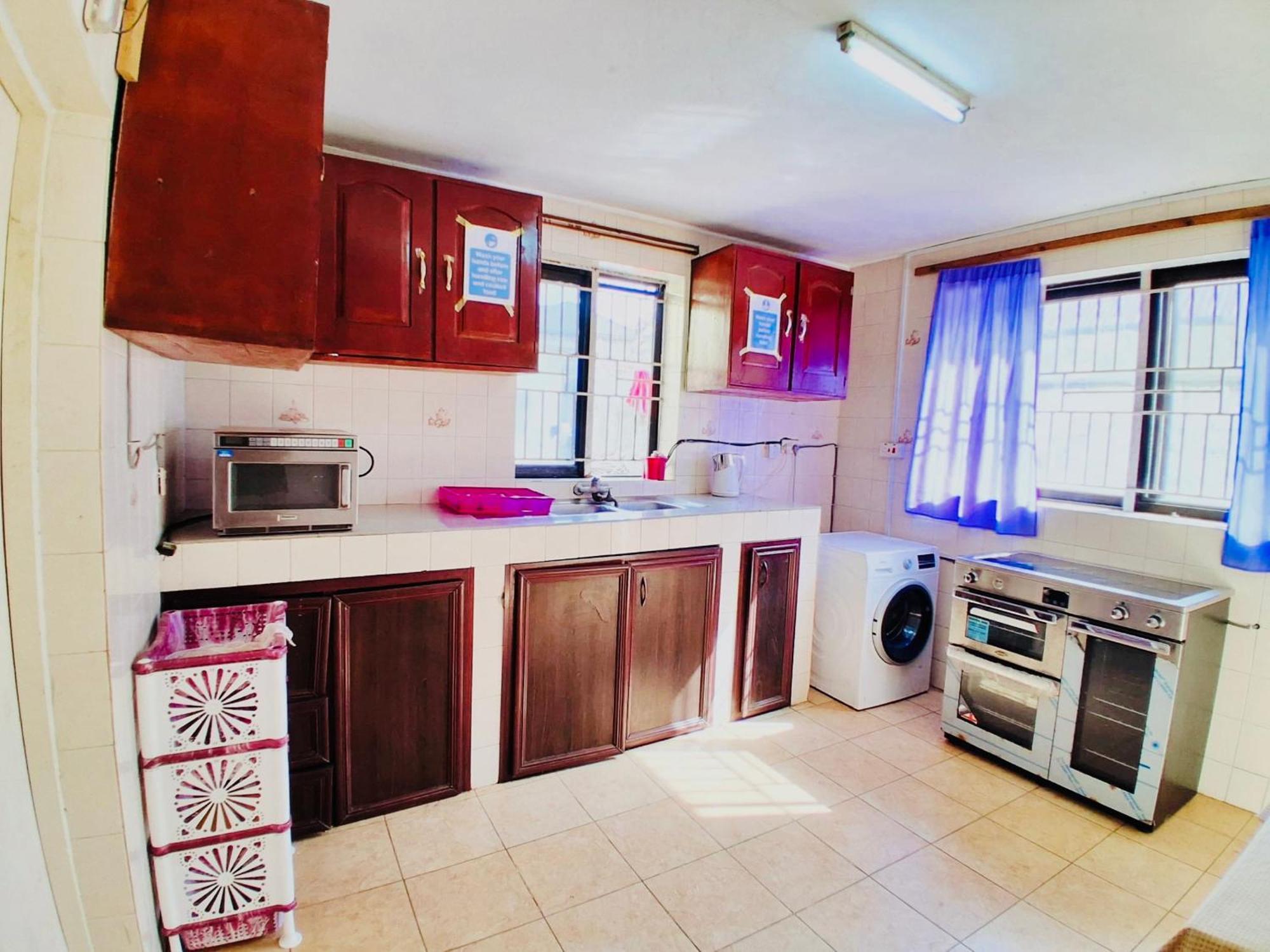 Zunox Guest House Фритаун Экстерьер фото